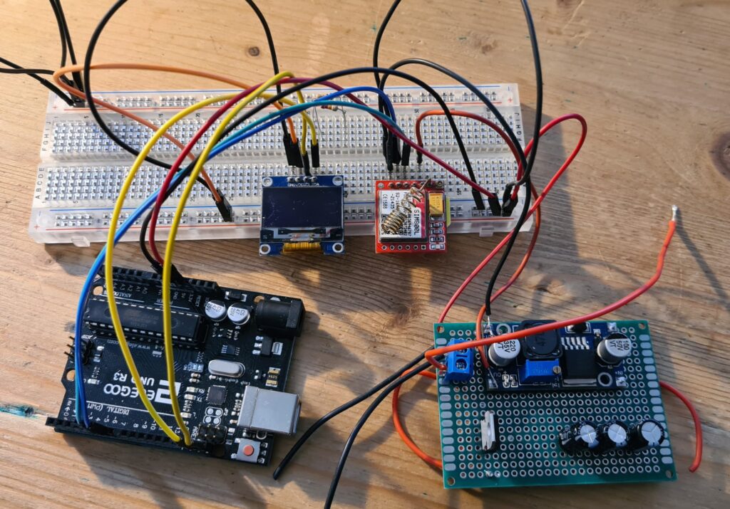 SIM800L module connected to Arduino UNO R3 on breadboard
